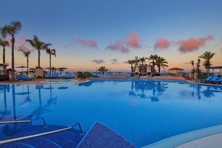 Outdoor pool sunset
